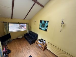 STUDY LOOKING DOWN TO FAMILY ROOM- click for photo gallery